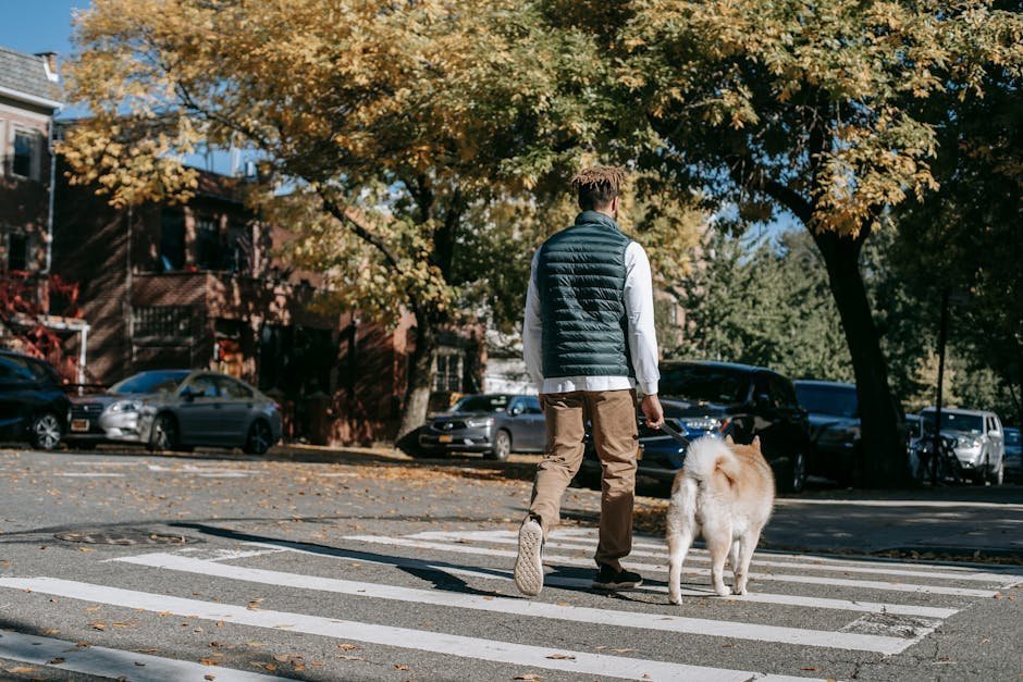 Person walking with companion on neighborhood street post-treatment