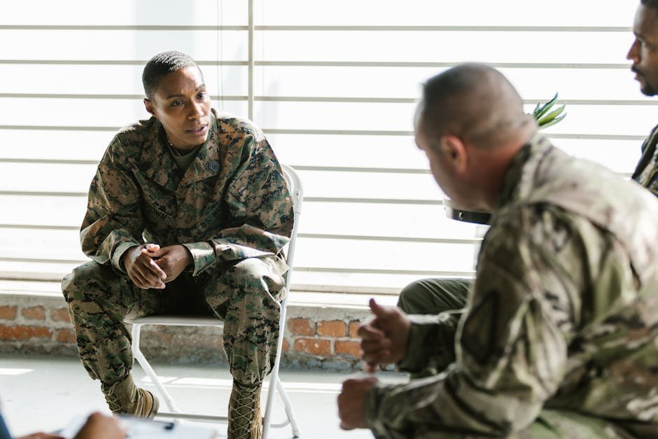 Female veteran in supportive group therapy circle