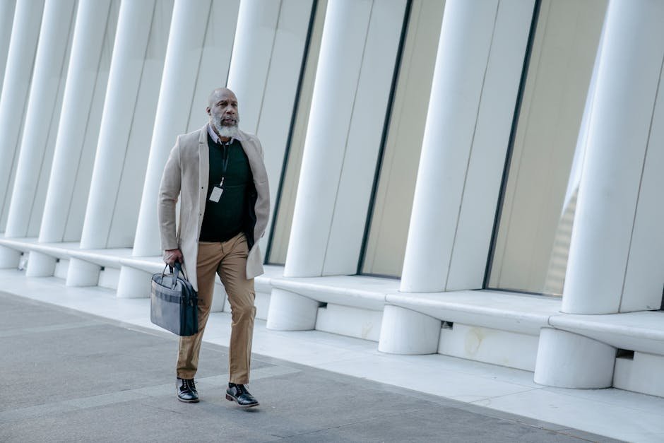 Adult walking on path between corporate skyline and creative workshop, symbolic career transition image